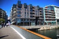 OSLO, NORWAY Ã¢â¬â AUGUST 17, 2016: People walking on modern district on street Stranden, Aker Brygge district with lux Royalty Free Stock Photo